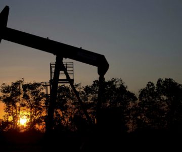 Oil prices recover ground after market turmoil fuels price plunge